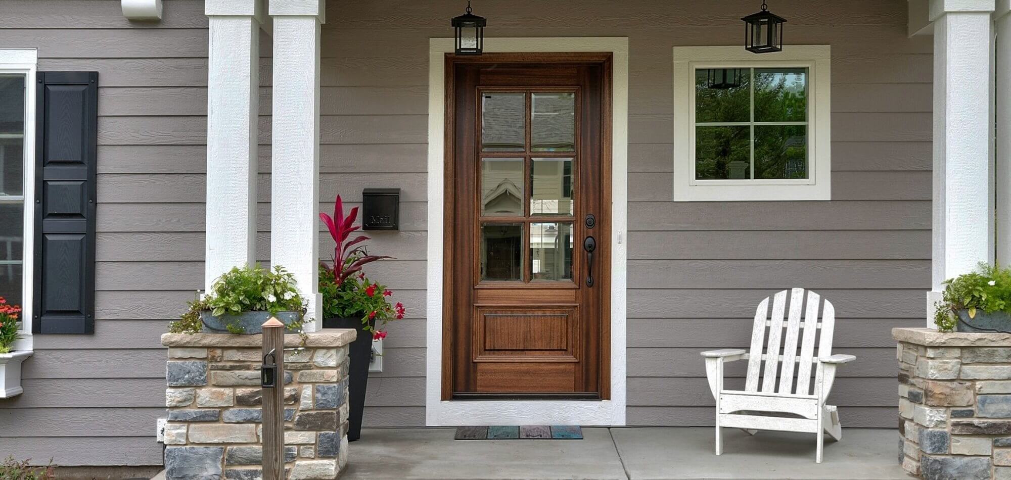 front porch with wood front door